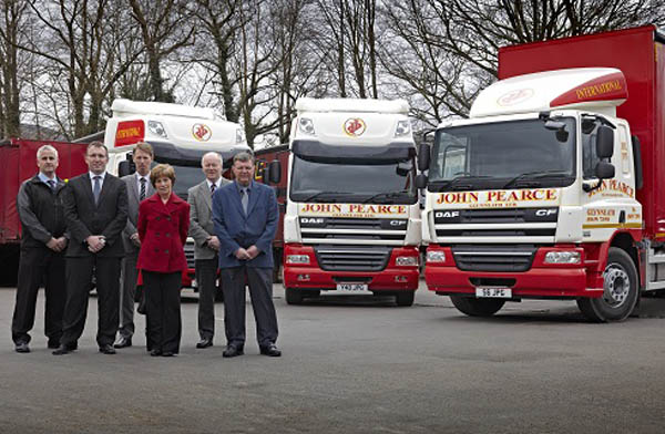 Left to right: Gareth Rees, Watts Truck and Van; Clive Davies, MD, John Pearce Glynneath Ltd; Gareth Halliwell, DAF; Joyce Pearce, Director; Simon Griffiths, MD, Watts Truck and Van; John Pearce, Director and company founder. 